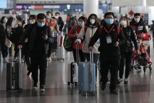 Passengers at Beijing airport on January 16, 2020